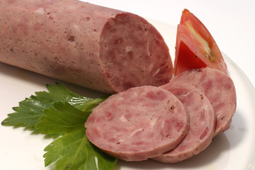 sausage balloon with slices and tomato