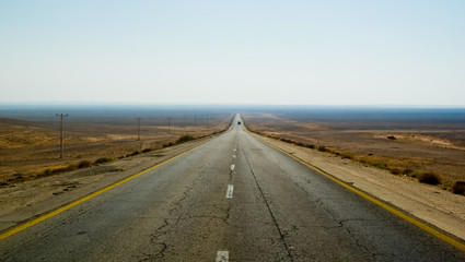 Straight road to nowhere - obrazy, fototapety, plakaty
