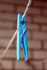 Clothes pin on the string shallow DOF shoot