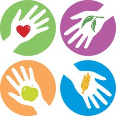 health related hands with apple, heart, wheat and plant