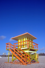 Green and Yellow Lifeguard Tower in South Beach