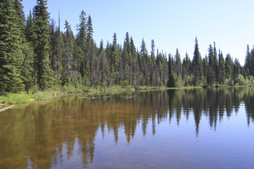 Fototapeta na wymiar 441 Lake with mountain reflection