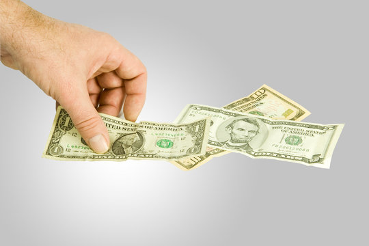 Picking up dollar notas