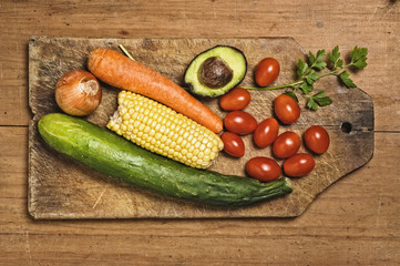 Vegetables on wooden table.