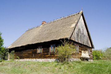 Fototapeta na wymiar old wooden house in kashubian ethnographic parc in poland