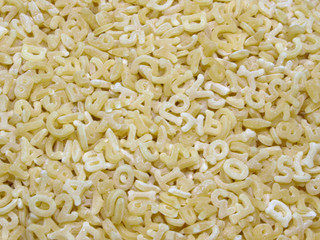 Buchstabennudeln (Hintergrund)