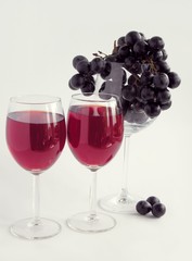 red wine and black grapes
