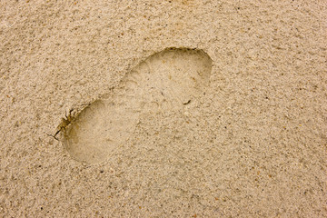 Footprints going over a sand