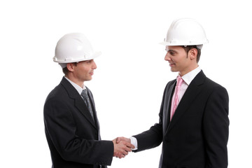 Two young Engineers closing a deal