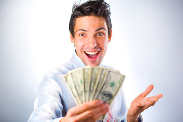 Happy Businessman with money isolated in white background