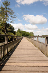 Fototapeta na wymiar Wooden walkway over the River Thames