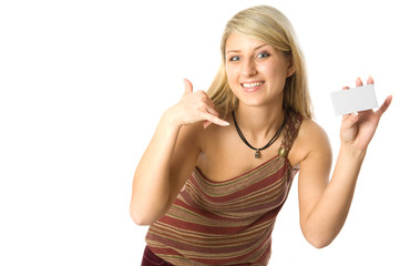 Obraz premium Portrait of a beautiful blonde girl holding a white card.