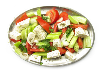 Greek salad with feta cheese, paprika, cucumber and tomato