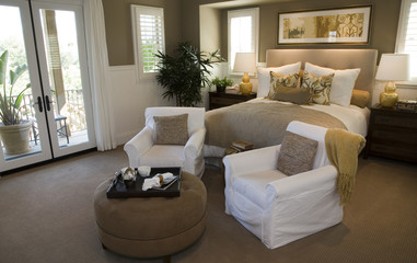 Designer bedroom with contemporary furniture and decor.