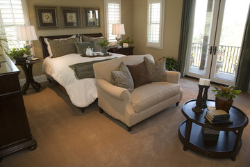 Fototapeta premium Designer bedroom with contemporary furniture and decor.