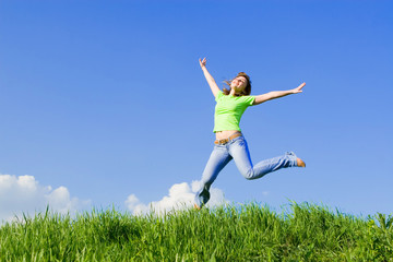 pretty young woman is jumping