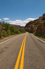 vibrant image of highway and blue sky