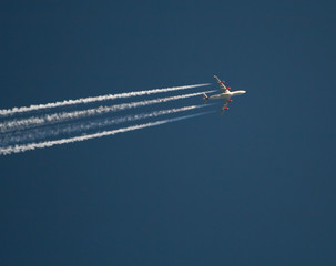 plane at the blue sky