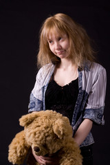 blonde girl with teddy bear