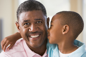 Obraz premium Grandfather and grandson hugging