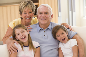 Grandparents posing with grandchildren