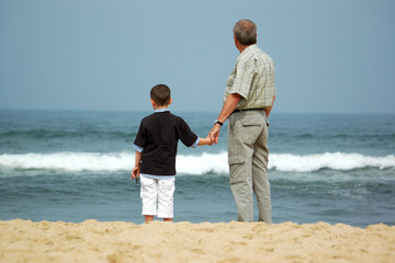 granddad and grandson holding hands