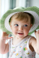 Child with a hat