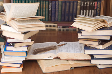 Books and a feather pen