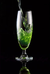 glass of drink poured
