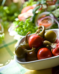 Fresh salad with pepper, tomato and basil