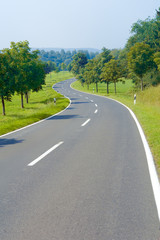 Fototapeta premium Empty countryside road at summer