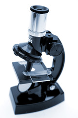 Microscope on white background