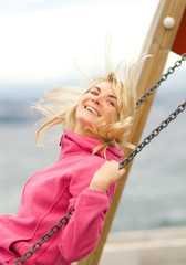 Beautiful young woman having fun outdoors