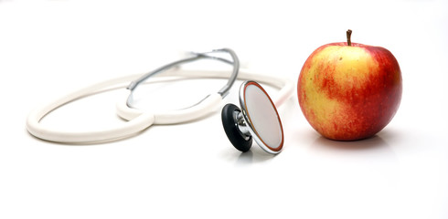 Stethoskop und Apfel