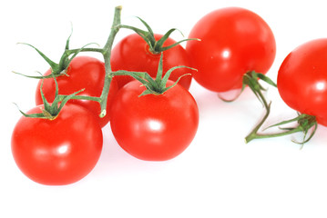 Fresh ripe red tomatoes on white background