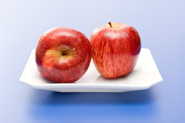 Apples in white plate