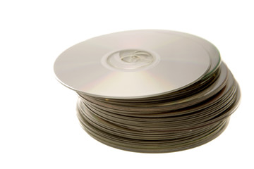 Stack of compact discs on white
