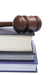 Wooden gavel and law books