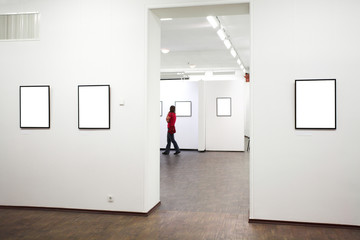 wall in museum with frames