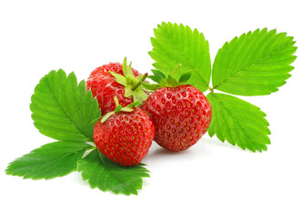 red strawberry fruits with green leafs isolated
