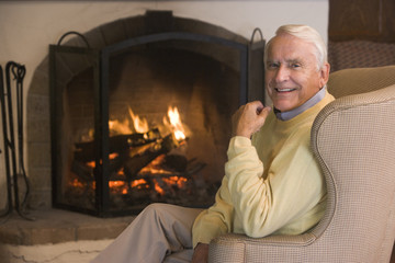 Man in living room smiling