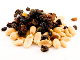 Stack Pile of Peanuts and Raisins on White Background
