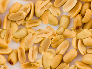 Repeating Tile Pattern of Peanuts on White Background Repeats