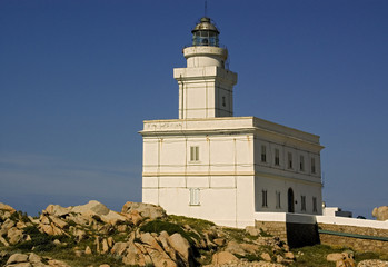 White Lighthouse on rocks