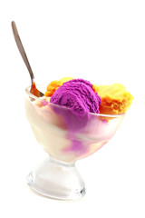 yellow and violet color ice cream over white