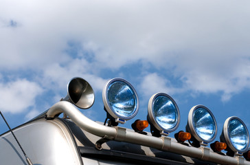 spot-lamps of the truck on the sky background