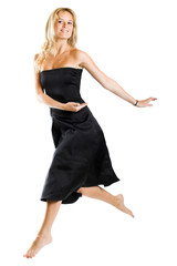 Naklejka premium jumping woman wearing a dress on white background