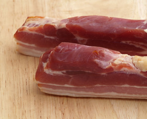 smoked bacon on wooden board
