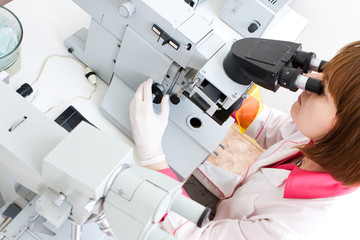 Working with microscope in lab