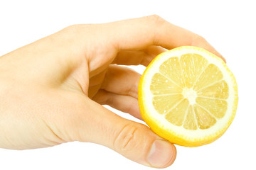 lemon with hand
